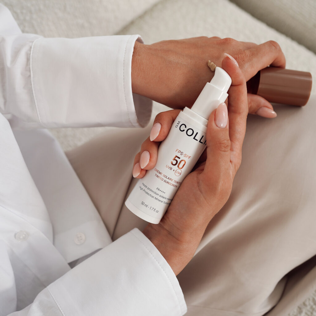 Lightweight protection cream SPF 50 with Tinted Sunscreen pigment coloring, capacity 50 ml in the palms